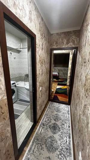 Фото 1 4-комн. квартира в Yunusobod tumani